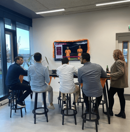 Watching Dutch national football with the team at the office